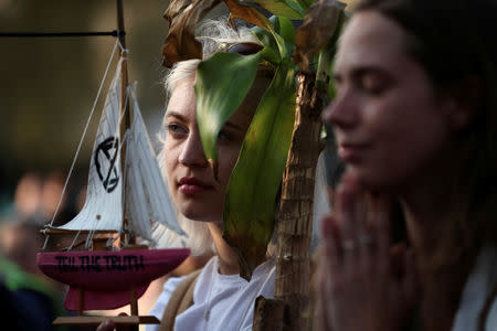 Climate change activists attend the Extinction Rebellion protest at Marble Arch in London, Britain April 21, 2019. REUTERS/Hannah McKay