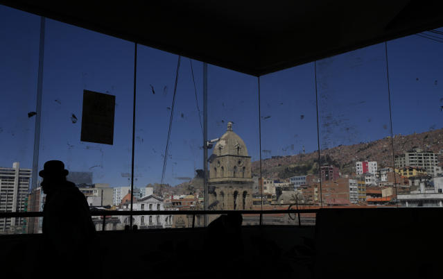 The Basilica of San Francisco is seen from inside a food market, in La Paz, Bolivia, Friday, May 26, 2023. Leaders of the Roman Catholic Church in Bolivia are acknowledging that the institution has been deaf to the suffering of victims of sexual abuse at a time when the country has been rocked by a pedophilia scandal involving priests. (AP Photo/Juan Karita)