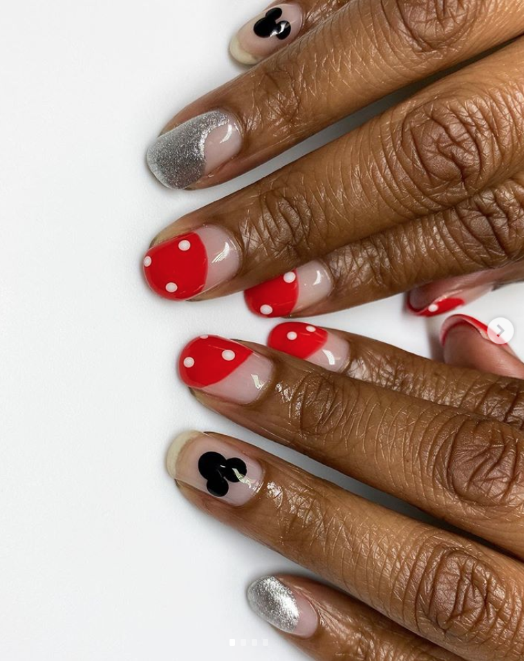 <p>Going for a Disney theme? Try <a href="https://www.instagram.com/p/B5i5wXXgNzo/" rel="nofollow noopener" target="_blank" data-ylk="slk:nail artist Canishiea J. Sams;elm:context_link;itc:0;sec:content-canvas" class="link ">nail artist Canishiea J. Sams</a>'s oh-so-cute Minnie and Mickey Mouse nails, with swoops of red and silver. <br></p><p><a class="link " href="https://go.redirectingat.com?id=74968X1596630&url=https%3A%2F%2Fwww.etsy.com%2Flisting%2F239597845%2F36-mickey-mouse-ears-nail-decals&sref=https%3A%2F%2Fwww.oprahdaily.com%2Fbeauty%2Fskin-makeup%2Fg33239588%2Fhalloween-nail-ideas%2F" rel="nofollow noopener" target="_blank" data-ylk="slk:SHOP NAIL DECAL;elm:context_link;itc:0;sec:content-canvas">SHOP NAIL DECAL</a></p>