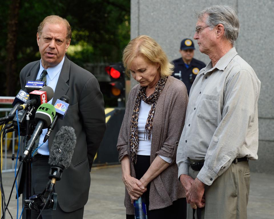 Sentencing: Ross Ulbricht’s attorney Joshua Dratel (L) speaks as Lyn (C) and Kirk Ulbricht, parents of Silk Road founder Ross Ulbricht, talk with reporters outside the Federal Courthouse May 29, 2015 in New York. Photo: DON EMMERT/AFP/Getty Images.