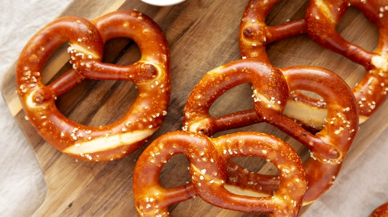 Soft pretzels on a wooden board