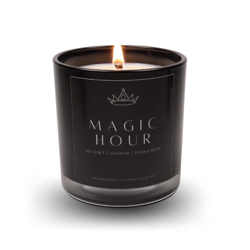 <p><a href="https://thenoblebrandco.com/collections/candles-melts/products/magic-hour-soy-candle" rel="nofollow noopener" target="_blank" data-ylk="slk:Shop Now;elm:context_link;itc:0;sec:content-canvas" class="link ">Shop Now</a></p><p>Magic Hour Soy Candle</p><p>thenoblebrandco.com</p><p>$30.00</p><span class="copyright">The Noble Brand </span>
