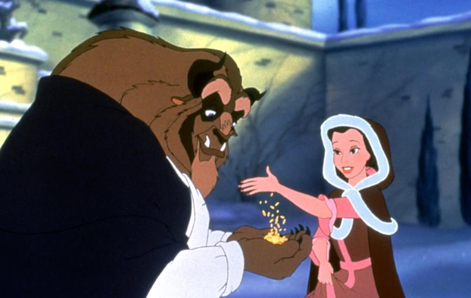 Belle keeping warm while gallivanting with the Beast in the animated version of “Beauty and the Beast.” 