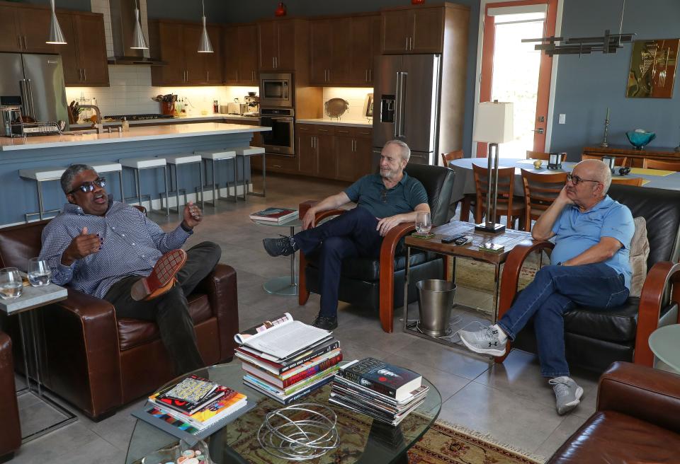 From right, Carlos Garcia, Wallace Colvard and Stephen Nelson talk about the growth in north Palm Desert that they are seeing in their neighborhood in Palm Desert, Calif., Jan. 31, 2023. 