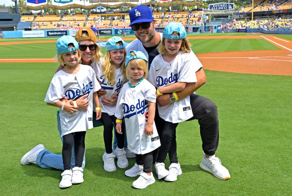 Los Angeles Rams quarterback Matthew Stafford with his wife, Kelly Stafford, and their four daughters on the field prior to the game between the Los Angeles Dodgers and the Atlanta Braves at Dodger Stadium on Sept. 3, 2023.