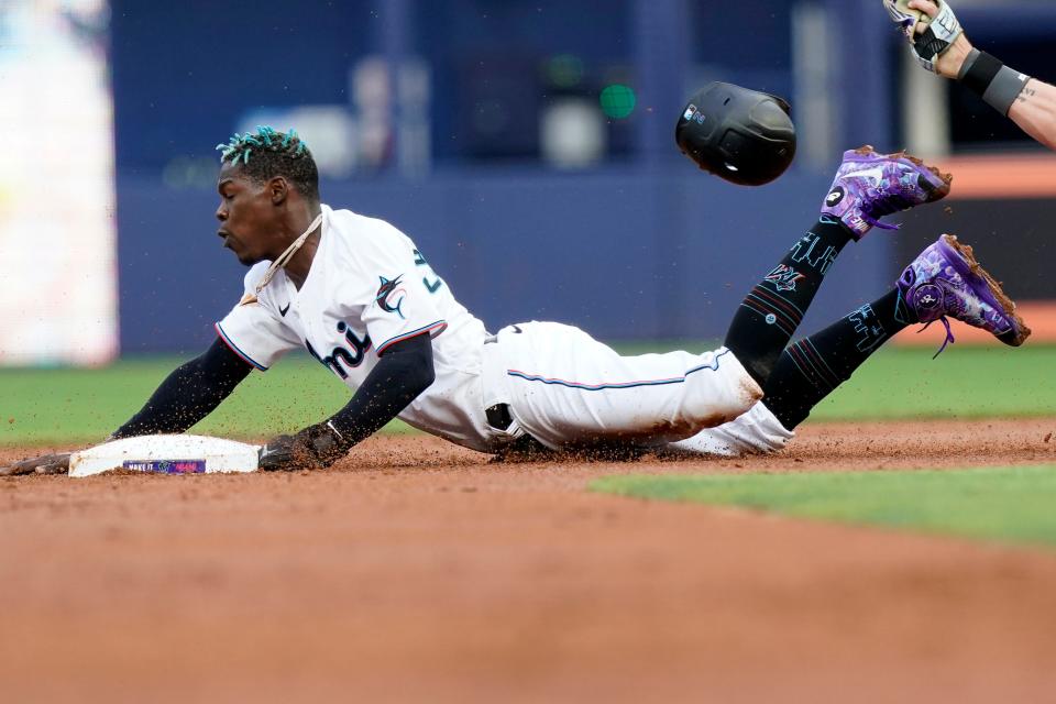 Miami Marlins' Jazz Chisholm Jr. is out stealing second during the first inning of a baseball game against the Colorado Rockies, Wednesday, June 22, 2022, in Miami. (AP Photo/Lynne Sladky)