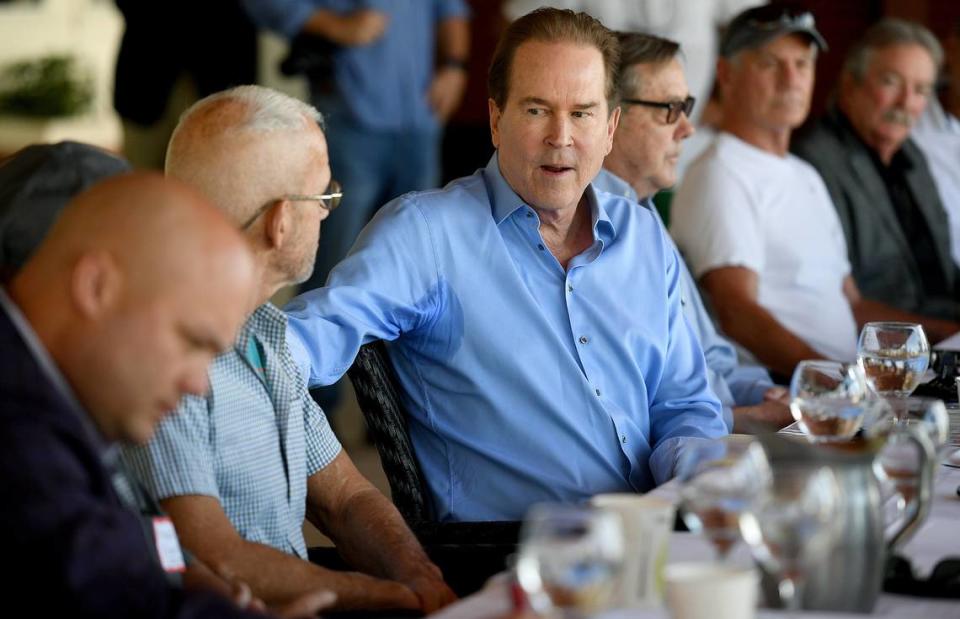 U.S. Congressman Vern Buchanan (R) participates in a roundtable discussion on increased levels of red tide in the Southwest Florida at the Beach House Restaurant in Bradenton Beach Friday.