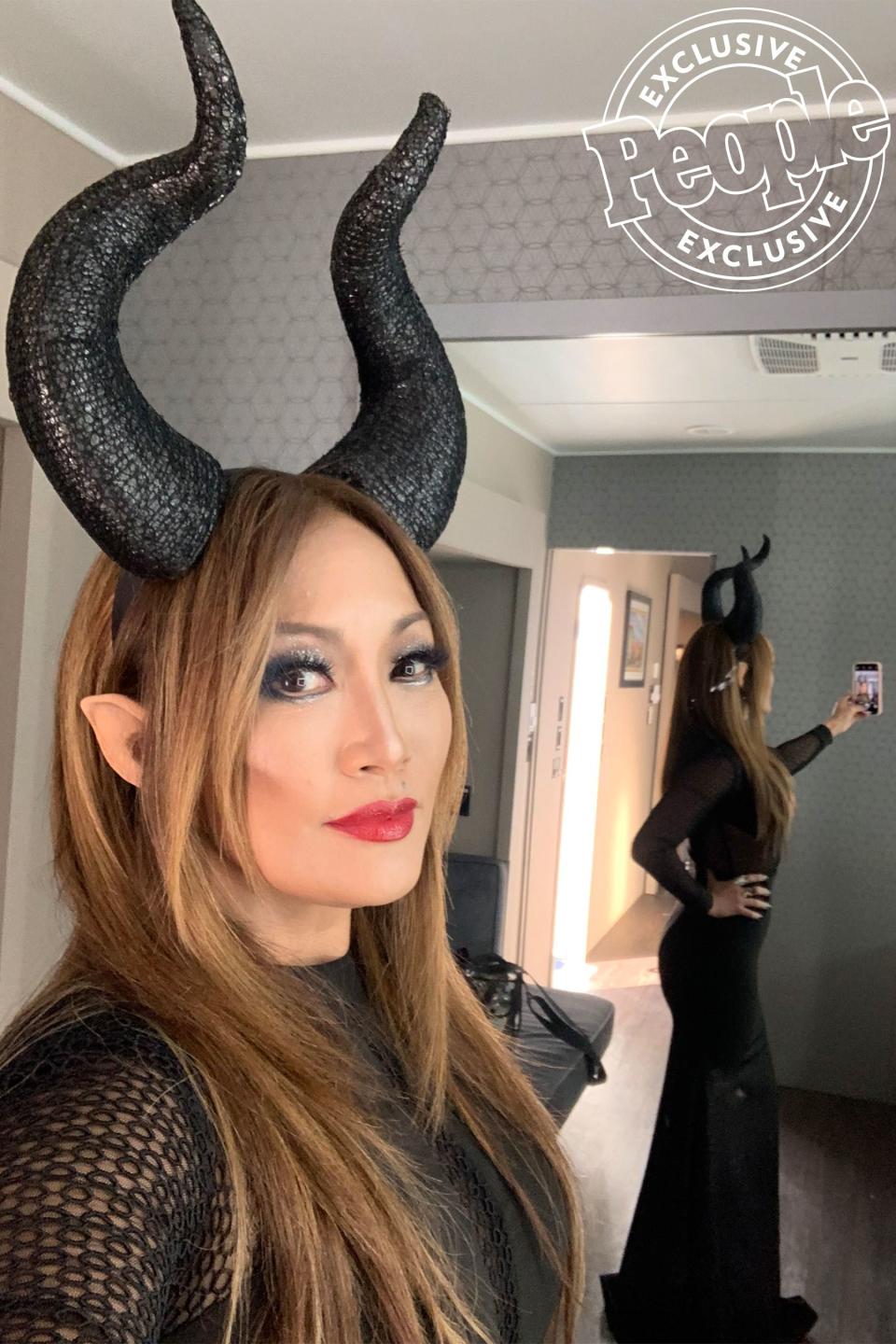 “Halloween is always a fun night on <em>DWTS</em>!” Carrie Ann’s stylist <a href="https://www.instagram.com/rhondaspiesstylist/" rel="nofollow noopener" target="_blank" data-ylk="slk:Rhonda Spies;elm:context_link;itc:0;sec:content-canvas" class="link ">Rhonda Spies</a> says. “We decided that Carrie Ann was going to be Maleficent, protector of the Ballroom.”