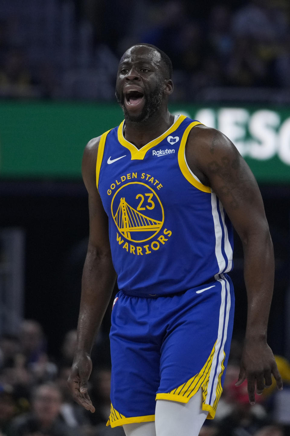 Golden State Warriors center Draymond Green reacts after scoring a 3-point basket against the San Antonio Spurs during the first half of an NBA basketball game Saturday, March 9, 2024, in San Francisco. (AP Photo/Godofredo A. Vásquez)