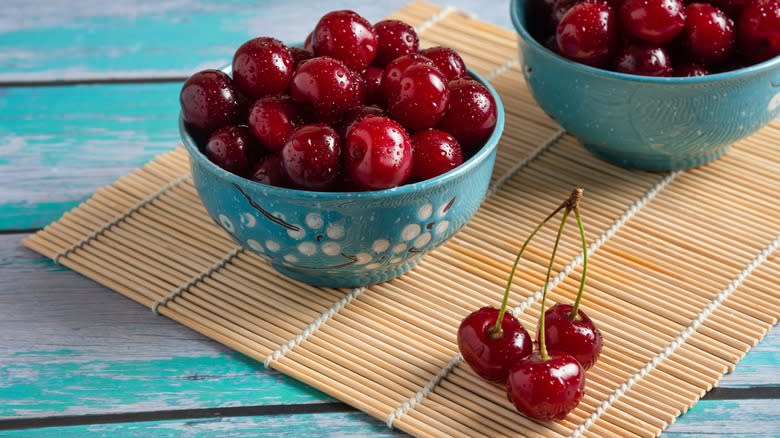 cherries in blue bowls