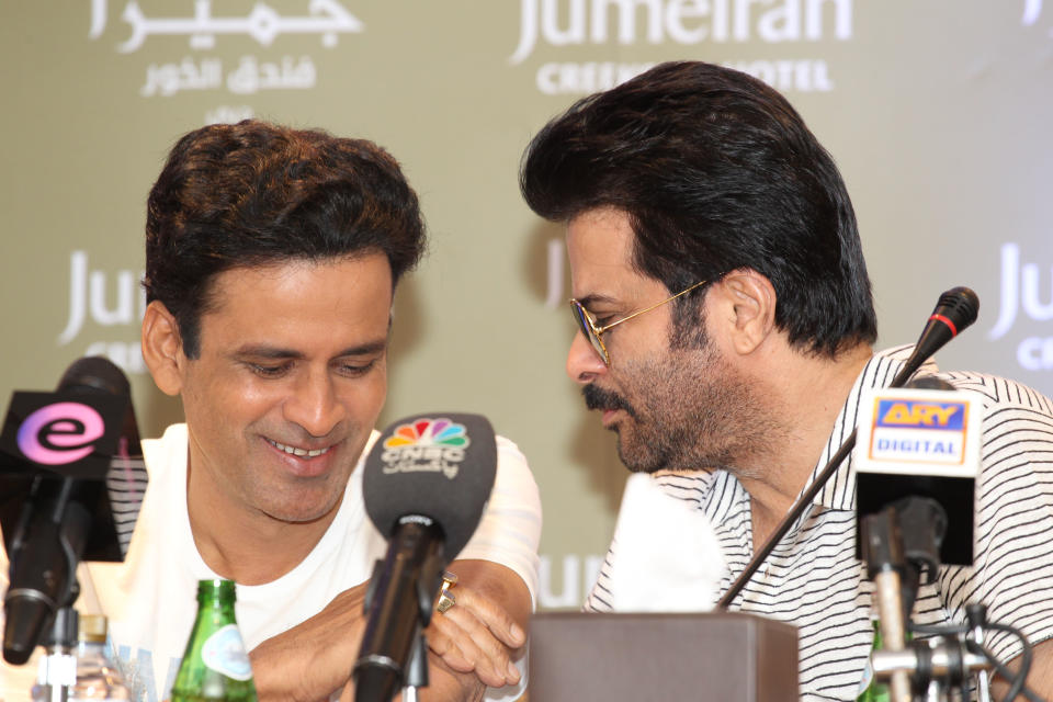 Anil Kapoor has a quiet word with Manoj Bajpai during the conference. Sanish Cherian/Yahoo! Maktoob