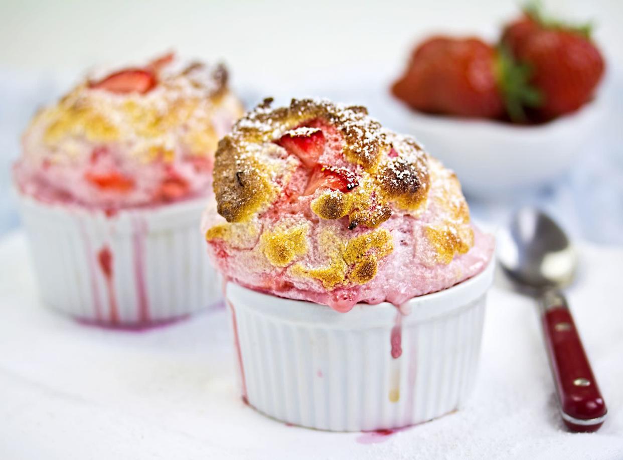 Strawberry souffle in white ramekins