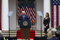 Judge Amy Coney Barrett listens as President Donald Trump announces Barrett as his nominee to the Supreme Court, in the Rose Garden at the White House, Saturday, Sept. 26, 2020, in Washington. (AP Photo/Alex Brandon)