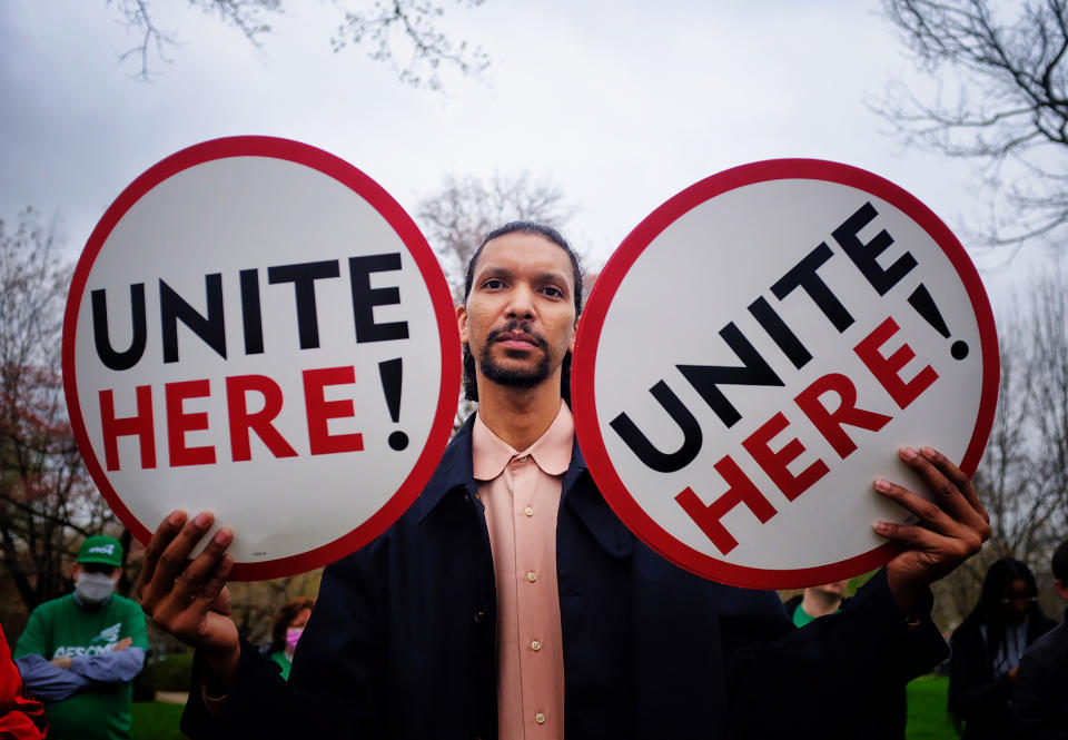 A Senate cafeteria worker protests near the U.S. Capitol this week. (Frank Thorp V / NBC News)