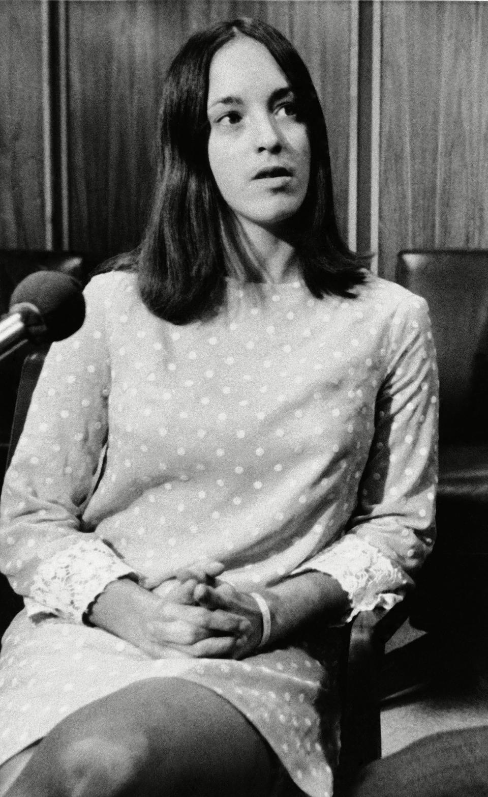 <p>Susan Atkins, then 21, is shown at a Dec. 3, 1969, news conference in Santa Monica, California, where her attorney, Richard Caballero, said she was at the scenes of the slayings of Sharon Tate and four others at her home and of Leno and Rosemary LaBianca. But she was under a "hypnotic spell" and had "nothing to do with the murders," Caballero said. She was "hypnotized and intrigued" into joining the cult led by Manson, he said.</p>