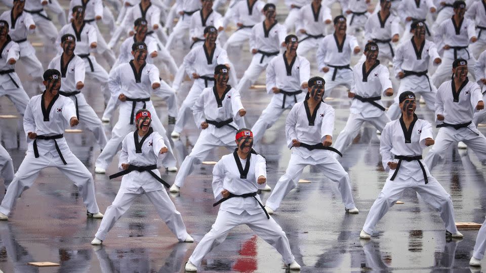 South Korean soldiers perform a taekwondo demonstration during the event. - Kim Hong-Ji/Reuters