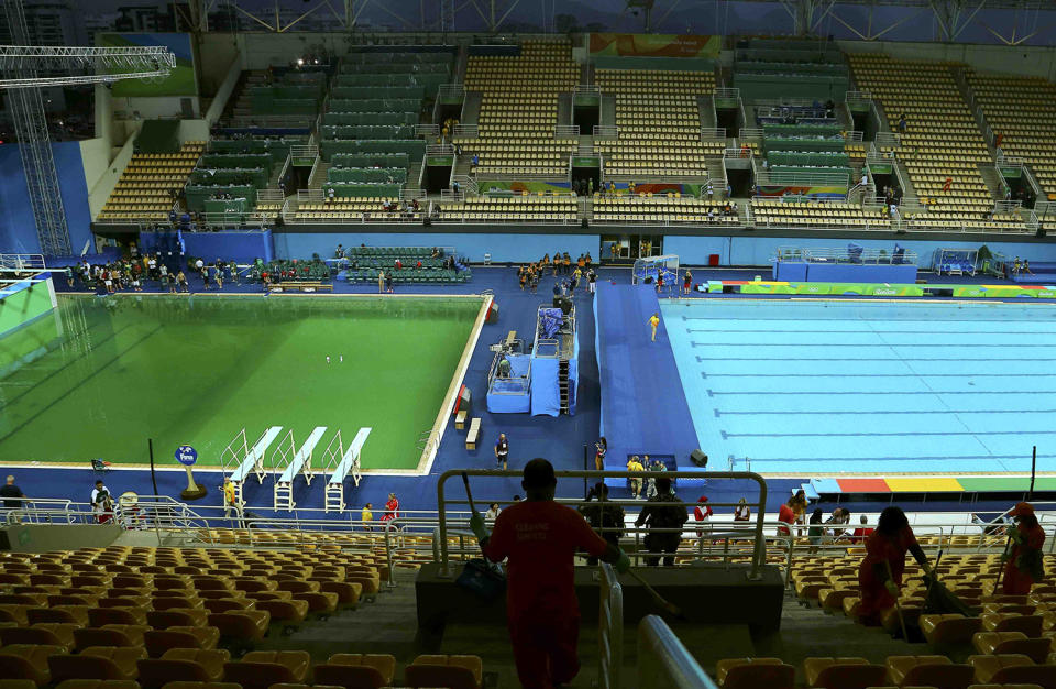 <p>Pools in the Maria Lenk Aquatic Center turned green within 24 hours of them reflecting a shiny blue. The cause? A worker dumped hydrogen peroxide into the pools, turning them green and apparently making them "smell like farts," quite embarrassing for Olympic officials. A lot can change in 24 hours. (REUTERS/Antonio Bronic) </p>