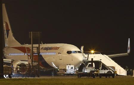 Malaysia Airlines flight MH192 from Kuala Lumpur to Bangalore is seen at Kuala Lumpur International Airport in Sepang, outside Kuala Lumpur, April 21, 2014. REUTERS/Samsul Said