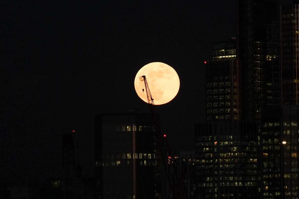 A blue super moon rises over the City of London. Seen from Hungerford Bridge in London,UK on January 31, 2018. (Photo by Claire Doherty/Sipa USA)