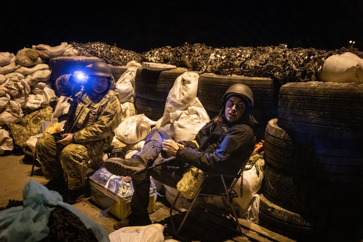 Members of a Territorial Defence unit guard a barricade close to the eastern frontline on March 5, 2022, in Kyiv, Ukraine.