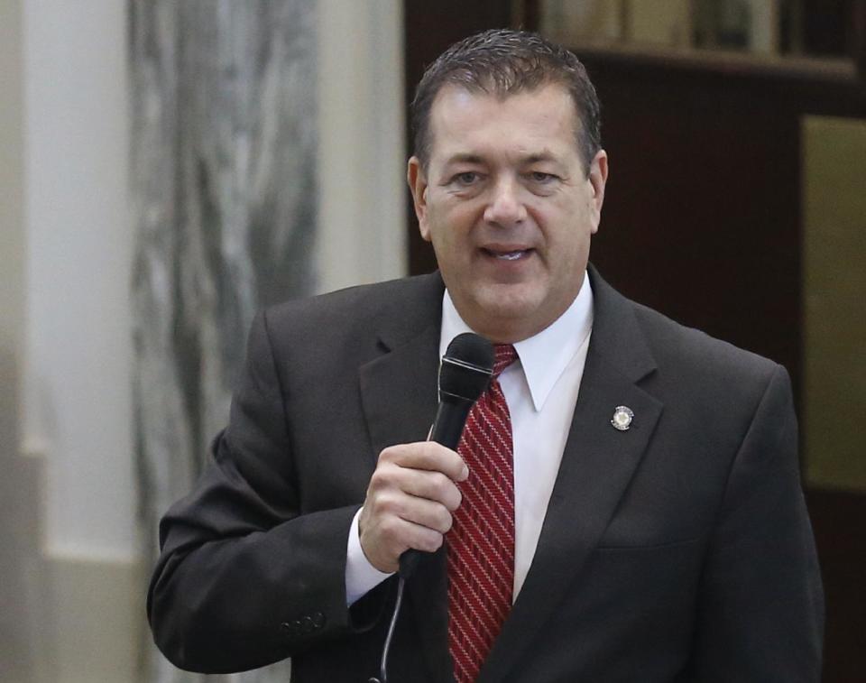 FILE - In this Tuesday, Jan. 3, 2017 file photo, Oklahoma state Rep. Dan Kirby, R-Tulsa, speaks on the floor of the Oklahoma House in Oklahoma City. The House voted to seat Kirby, who rescinded a letter of resignation he submitted after being named in a sexual harassment complaint. When a sexual harassment scandal erupted in the Oklahoma House of Representatives, the chamber's newly minted leader had to create a closed-door committee to look into the allegations. Kirby resigned his office two days after a special House committee recommended he be expelled from office. (AP Photo/Sue Ogrocki, File)