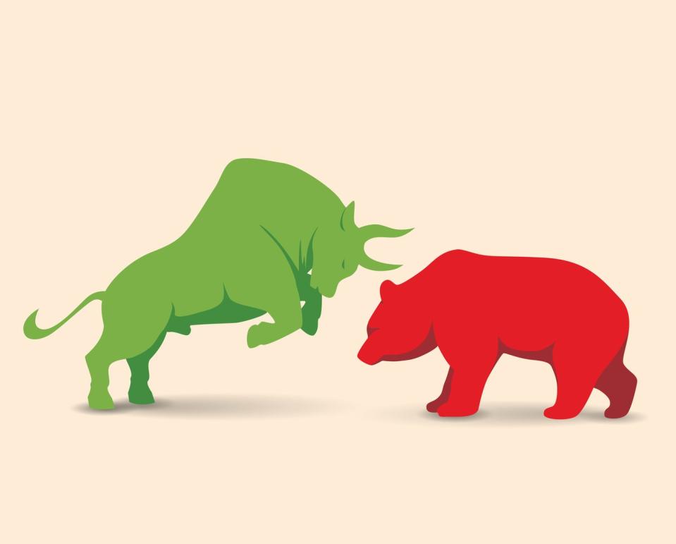 Bull and bear face each other.