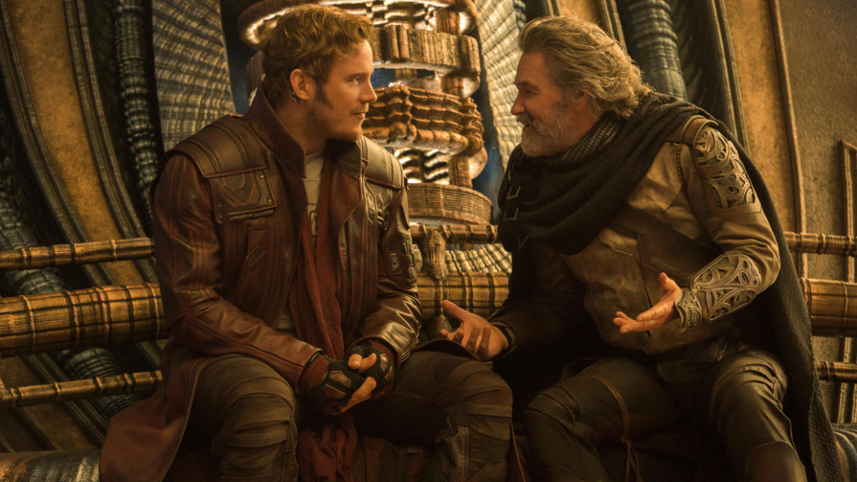  Star-Lord sits listening to Ego in conversation in Guardians of the Galaxy Vol. 2. 