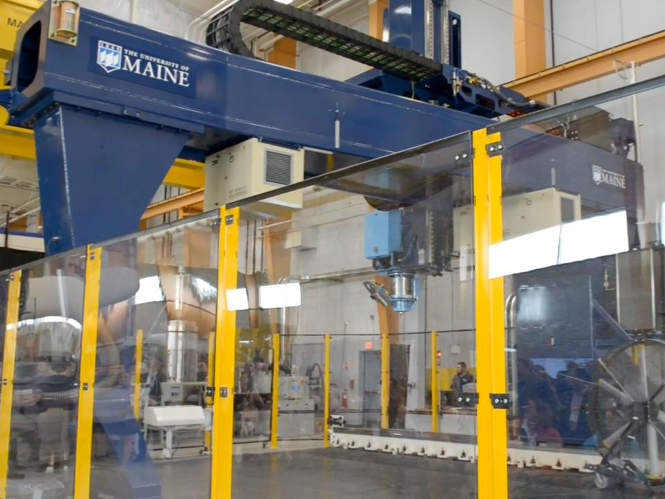 University of Maine Advanced Structures & Composites Center's polymer 3D printer in the manufacturing facility.