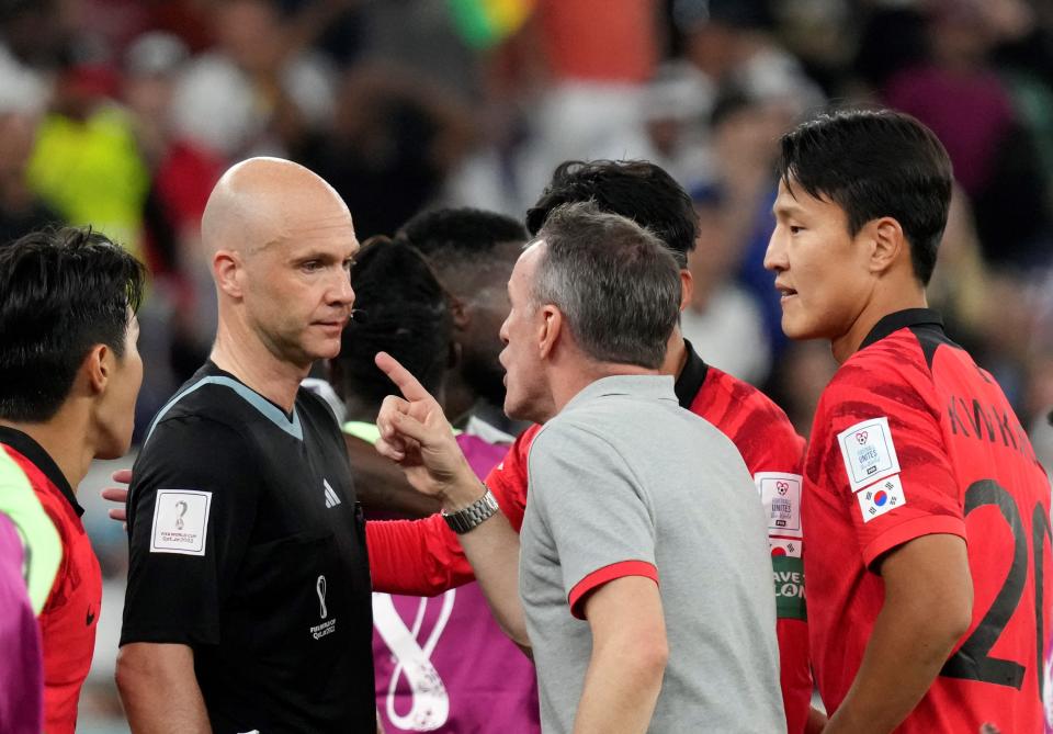 Paulo Bento (R, front), head coach of South Korea, reacts after receiving a red card from referee Anthony Taylor 2nd L during the Group H match between South Korea and Ghana at the 2022 FIFA World Cup at Education City Stadium in Al Rayyan, Qatar, Nov. 28, 2022. (Photo by Li Gang/Xinhua via Getty Images)