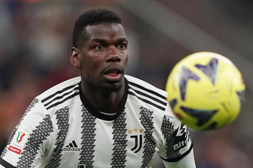 Juventus' Paul Pogba keeps his eyes on the ball during an Italian Cup soccer match between Inter Milan and Juventus in 2023.