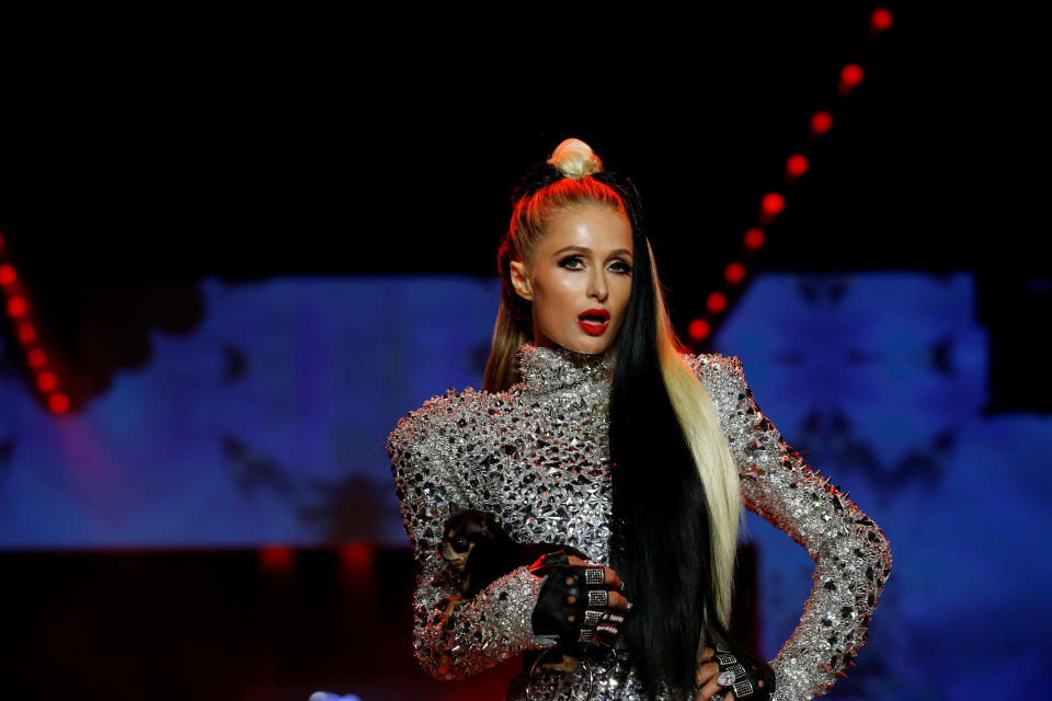 Paris Hilton presents a creation from The Blonds Spring/Summer 2019 collection during New York Fashion Week in the Manhattan borough of New York City, U.S., September 7, 2018. REUTERS/Caitlin Ochs