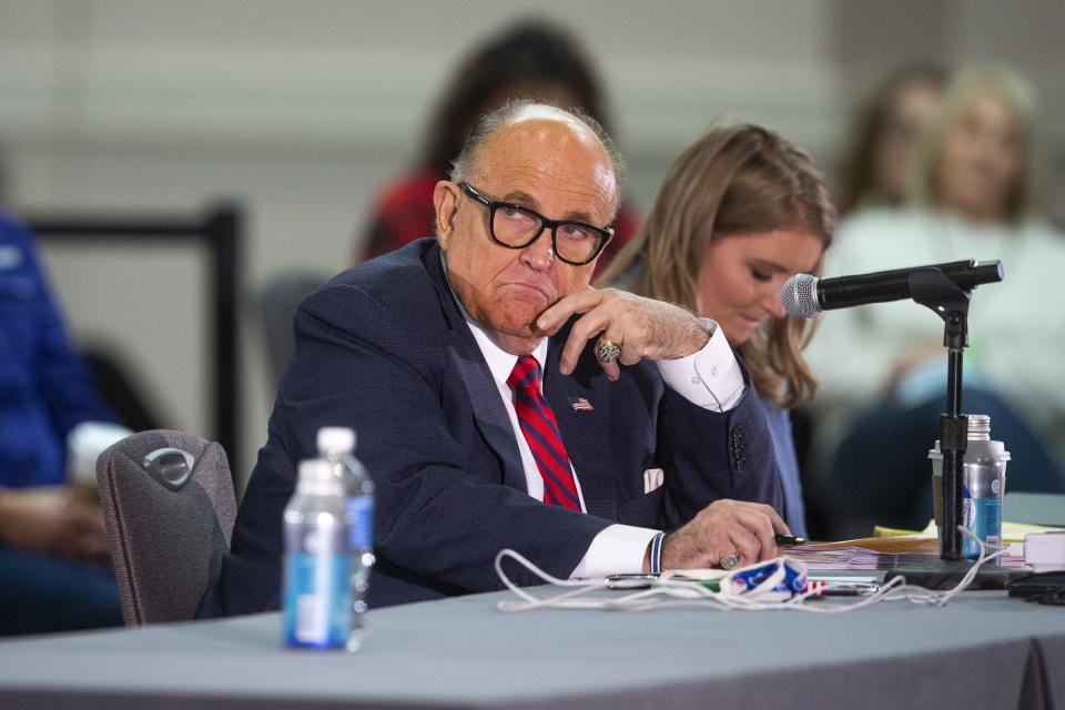 Rudy Giuliani at a public meeting at the Hyatt Regency Hotel in Phoenix on Nov. 30, 2020.