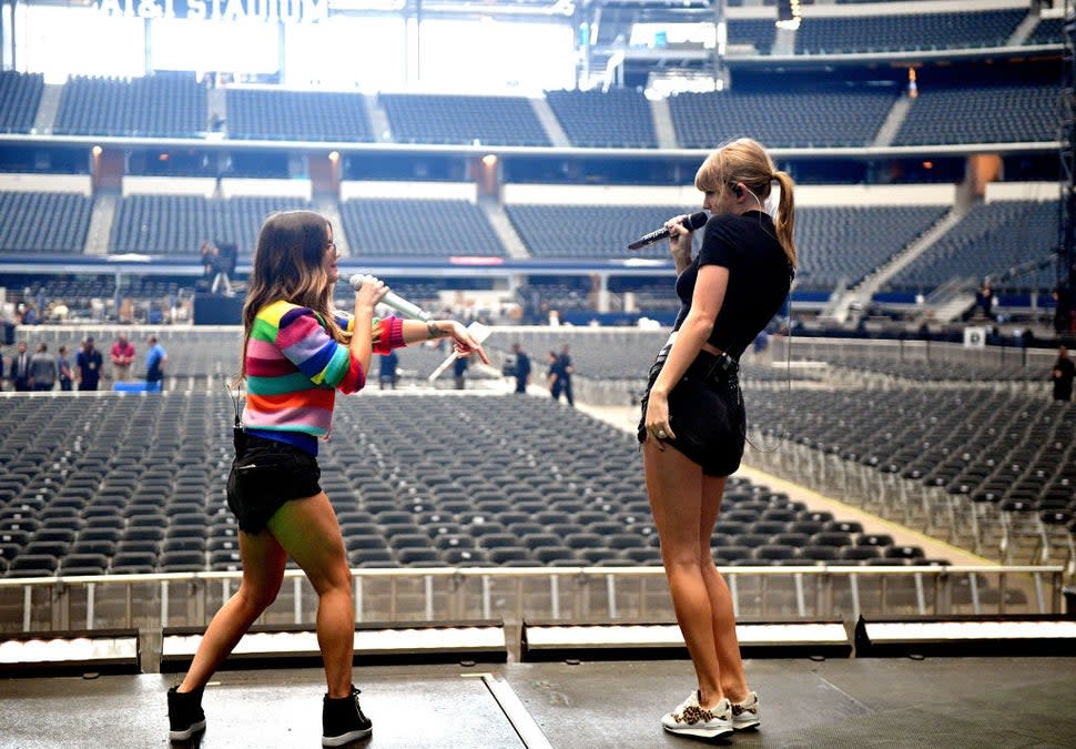ARLINGTON, TX - OCTOBER 05: Maren Morris (L) and Taylor Swift onstage during rehearsals for the reputation Stadium Tour at AT&T Stadium on October 5, 2018 in Arlington, Texas.
