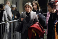 Attorney Gloria Allred, center, leaves the courtroom of the Harvey Weinstein rape trial during the lunch break, in New York, Thursday, Feb. 13, 2020. (AP Photo/Richard Drew)