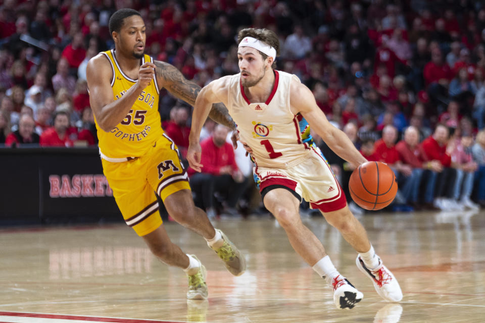 Minnesota's Ta'Lon Cooper guards Nebraska's Sam Hoiberg as he drives to the basket during the first half of an NCAA college basketball game, Saturday, Feb. 25, 2023, at Pinnacle Bank Arena in Lincoln, Neb. (Kenneth Ferriera/Lincoln Journal Star via AP)