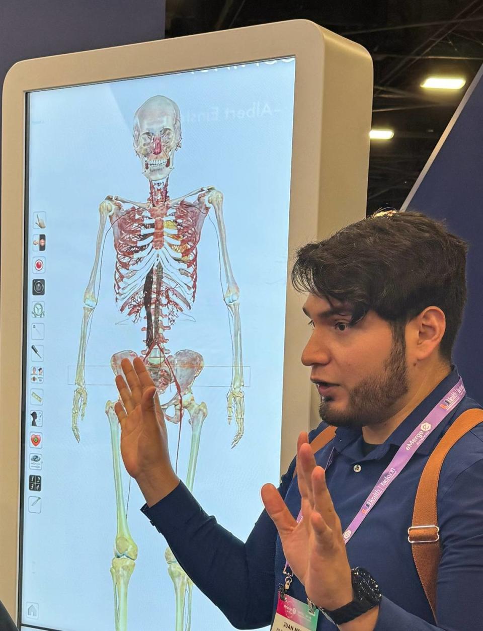 Juan Melo of Miami Dade College explains how the 3D virtual dissection table can help students better understand how the human body works on April 18, 2024 during the 10th annual eMerge Americas conference in Miami Beach, FL.