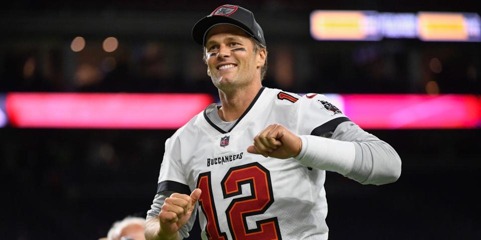 Tom Brady walks off the field after a preseason game.