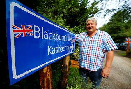 Gary Blackburn, a 53-year-old tree surgeon from Lincolnshire, Britain, is posing outside his British curiosities collection called "Little Britain" in Linz-Kretzhaus, south of Germany's former capital Bonn, Germany, August 24, 2017. REUTERS/Wolfgang Rattay