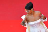 <p>"Never a failure, Always a lesson" are the words scrolled across Rihanna's collarbone — but they're backwards, so she can read it when she looks in the <a href="https://www.womansday.com/life/a16481284/every-parent-with-baby-car-seat-mirror-mom-scary-video/" rel="nofollow noopener" target="_blank" data-ylk="slk:mirror;elm:context_link;itc:0;sec:content-canvas" class="link ">mirror</a>.</p>