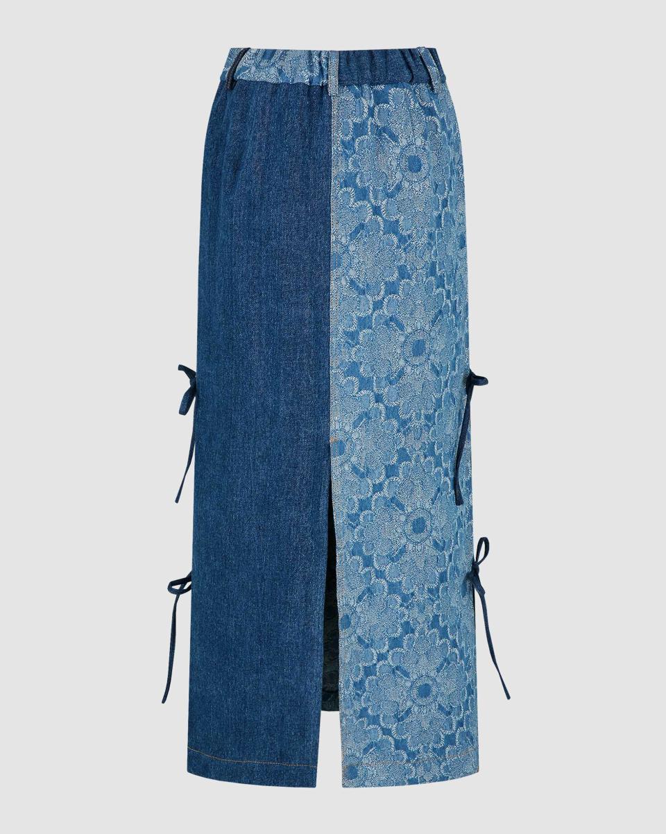 <p><a href="https://sundae.school/collections/all/products/pre-order-yin-yang-denim-maxi-tie-skirt" rel="nofollow noopener" target="_blank" data-ylk="slk:Shop Now;elm:context_link;itc:0;sec:content-canvas" class="link ">Shop Now</a></p><p>Yin-Yang Denim Maxi Tie Skirt</p><p>$170.00</p><p>sundae.school</p><span class="copyright">Sundae School</span>