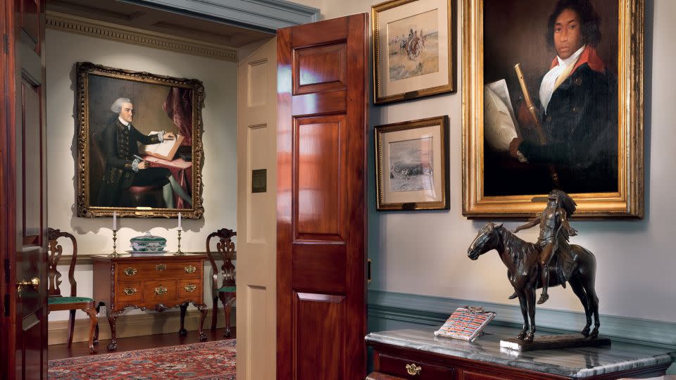 "Curators of American art at this time are really hyper-focused on adding works by women artists, by indigenous artists, by African American artists, and including their voices in this complicated history," Betsy Kornhauser told CNN. Pictured above right, "A Flutist, hung in the Walter Thurston Gentlemen's Lounge. - Durston Saylor/Courtesy Rizzoli