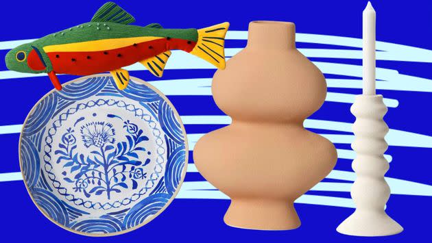 Fish pillow, blue bowl, tan vase and ceramic candlestick holder. 