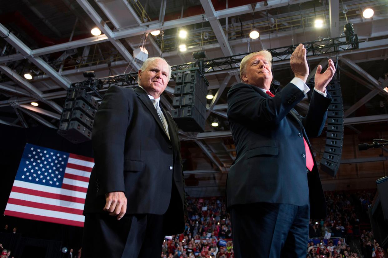 US President Donald Trump alongside radio talk show host Rush Limbaugh arrive at a Make America Great Again rally in Cape Girardeau, Missouri on November 5, 2018. 