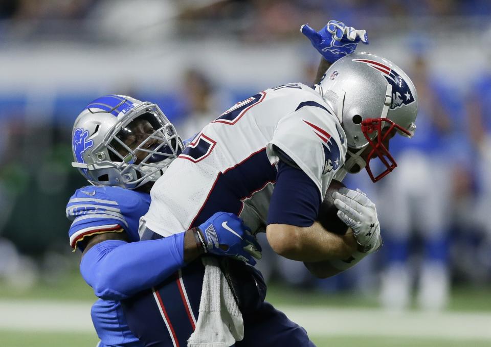 Detroit Lions linebacker Eli Harold sacks New England Patriots quarterback Tom Brady during the second half of an NFL football game, Sunday, Sept. 23, 2018, in Detroit. (AP Photo/Duane Burleson)