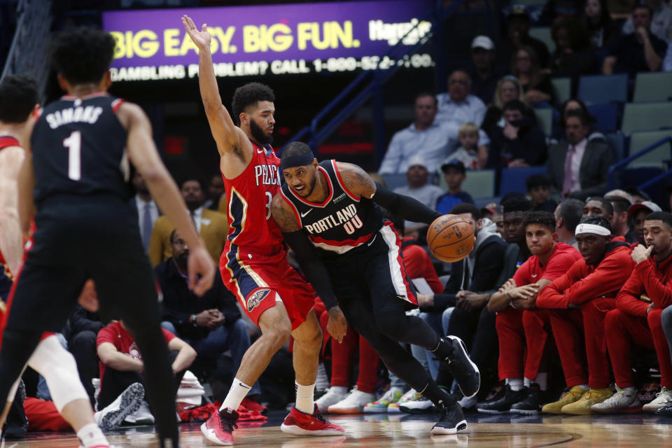 Portland Trail Blazers forward Carmelo Anthony (00) drives to the basket against New Orleans Pelicans guard Josh Hart (3) in the first half of an NBA basketball game in New Orleans, Tuesday, Nov. 19, 2019. (AP Photo/Gerald Herbert)