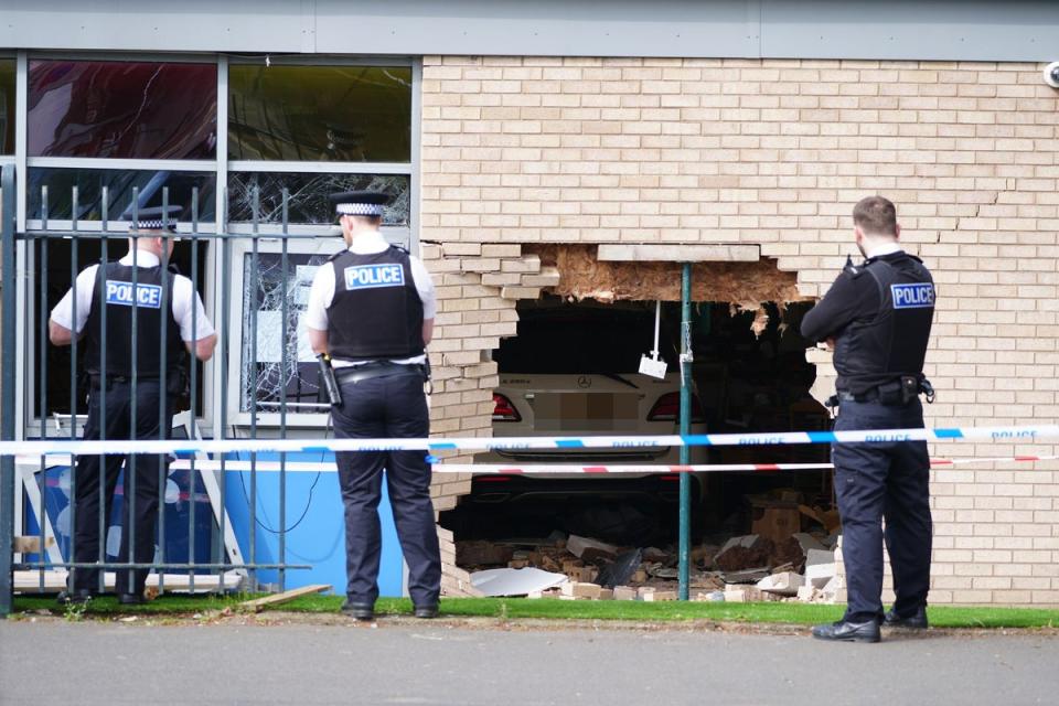 Police have cordoned off the school (PA)