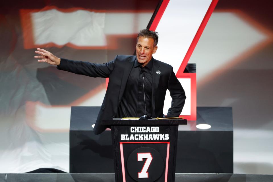 Former Chicago Blackhawks great Chris Chelios speaks during his jersey retirement ceremony before an NHL hockey game between the Chicago Blackhawks and Detroit Red Wings at the United Center in Chicago on Sunday, Feb. 25, 2024.