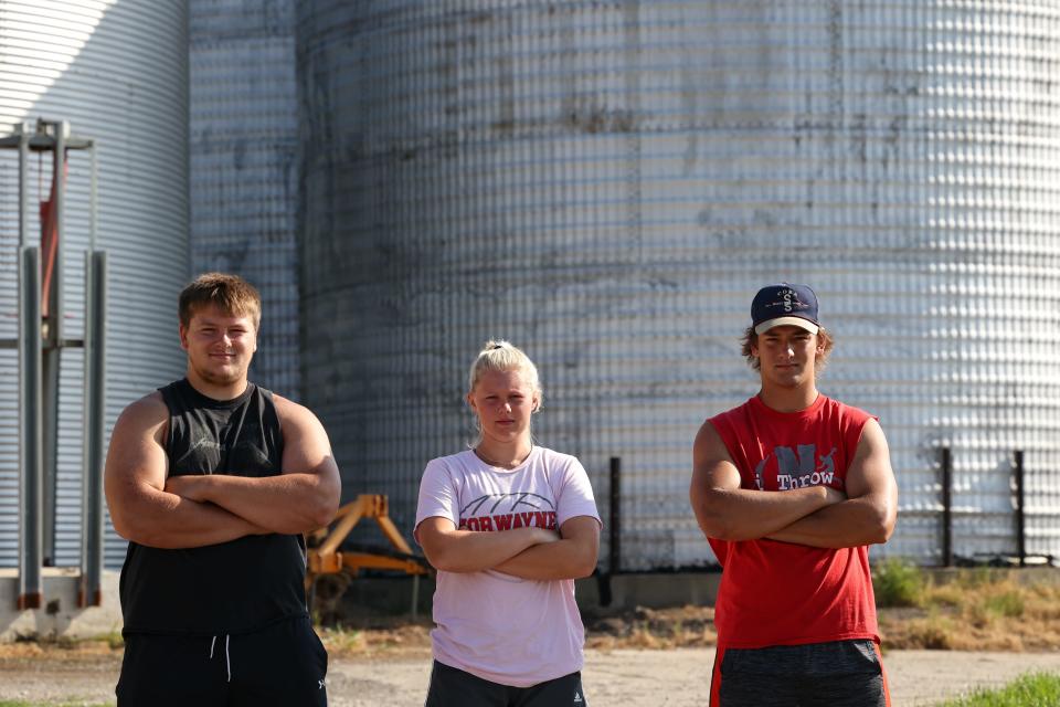 Dillon Morlock here in 2021 with his cousin Allie Morlock and his brother Colby, before the two brothers swiped both Div. III throwing event State Titles.