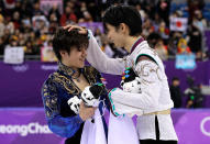 <p>Gold medal winner Yuzuru Hanyu, right, of Japan reacts with teammate and silver medalist Shoma Uno after the men’s free figure skating final in the Gangneung Ice Arena at the 2018 Winter Olympics in Gangneung, South Korea, Saturday, Feb. 17, 2018. (AP Photo/David J. Phillip) </p>