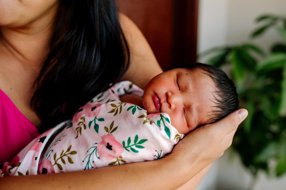 It's essential to learn how to properly swaddle a baby because improper swaddling has been linked to the development of hip dysplasia and sudden infant death syndrome (SIDS). (Photo via Getty Images)
